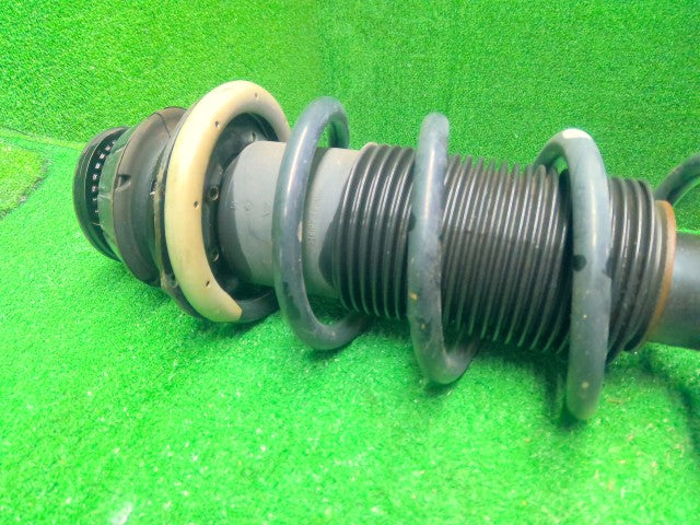 ノート 左Ｆストラット DAA-HE12 E4303-5WK2A