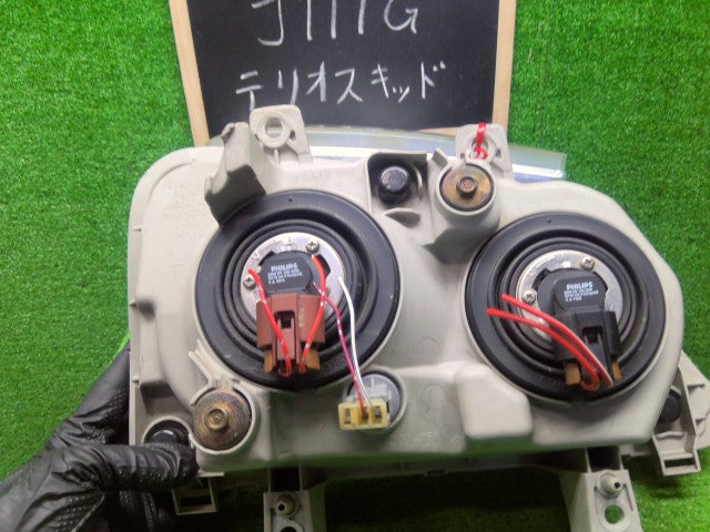 【中古】テリオスキッド ABA-J111G ヘッドランプ左右セット 81110-B4140