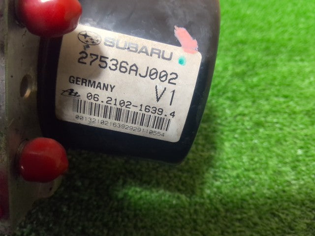 【中古】レガシィ DBA-BR9 ＡＢＳアクチュエーター 27596AJ002