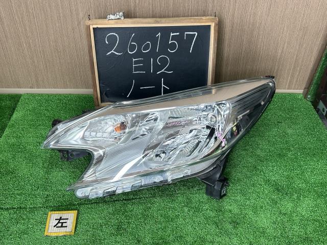 【中古】ノート DBA-E12 左ヘッドランプ 左ヘッドライト