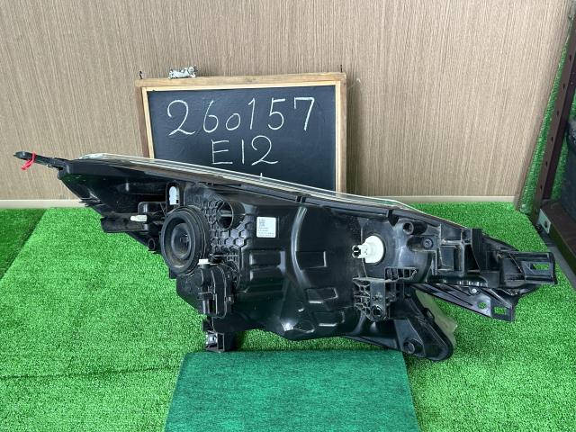 【中古】ノート DBA-E12 左ヘッドランプ 左ヘッドライト