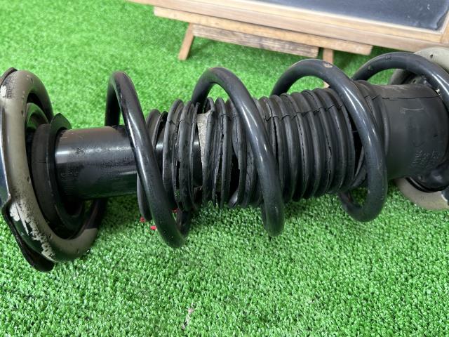 【中古】ノート DBA-E12 左フロントストラット ショック
