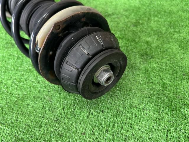 【中古】ノート DBA-E12 左フロントストラット ショック