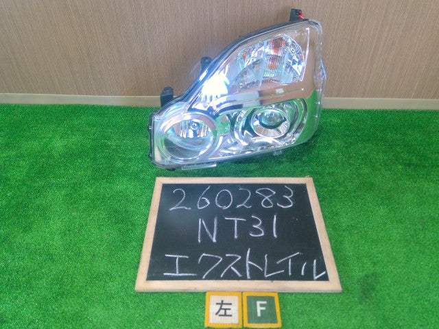 【中古】エクストレイル DBA-NT31 左ヘッドランプ 左ヘッドライト