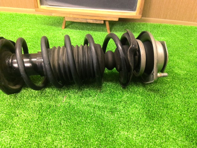 【中古】ムーヴ DBA-L185S 左フロントストラット ショック
