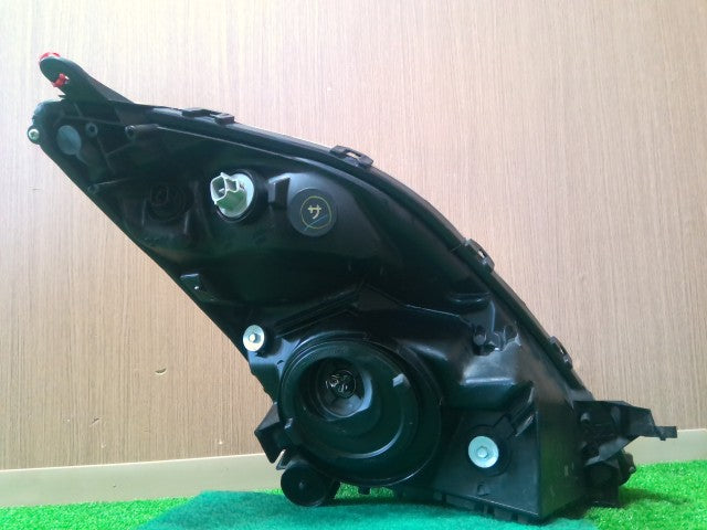 【中古】プリウス DAA-NHW20 左 ヘッドランプ