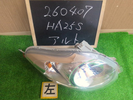 【中古】アルト DBA-HA25S 左ヘッドランプ ヘッドライト