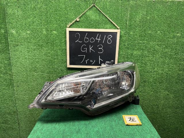 【中古】フィット DBA-GK3 左ヘッドランプＡＳＳＹ 33150-T5A-N01