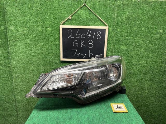 【中古】フィット DBA-GK3 左ヘッドランプＡＳＳＹ 33150-T5A-N01