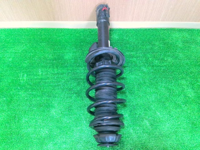 【中古】ヴィッツ DAA-NHP130 左フロントストラット 48520-52F60